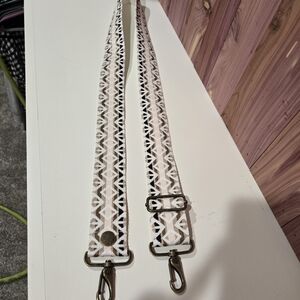 Geometric Patterned Strap W/ Antique Brass Ends.